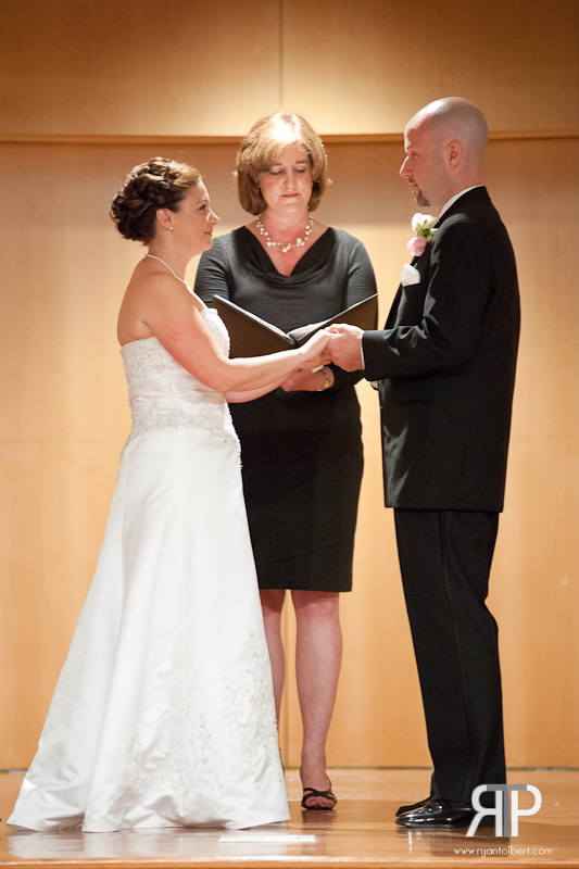 exchanging wedding vows at w.o smith music school