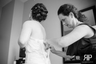 bride and her mom with the wedding dress