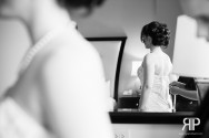 bride getting on her dress
